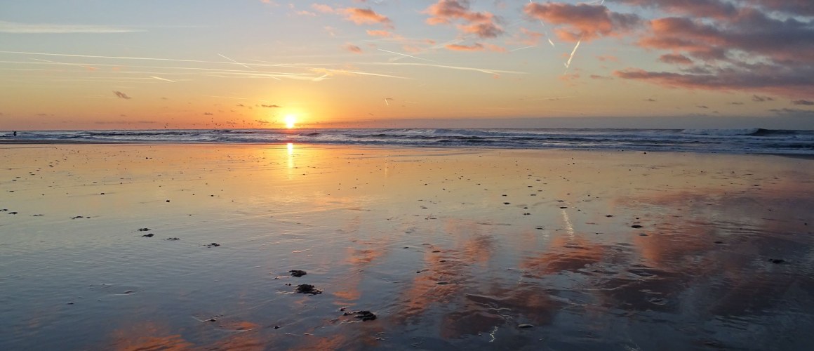 Zonsondergang op het strand doo r Jip Vrooman